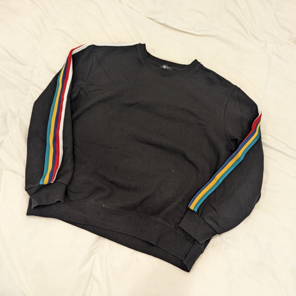 Black crewneck sweatshirt with rainbow striped sleeves